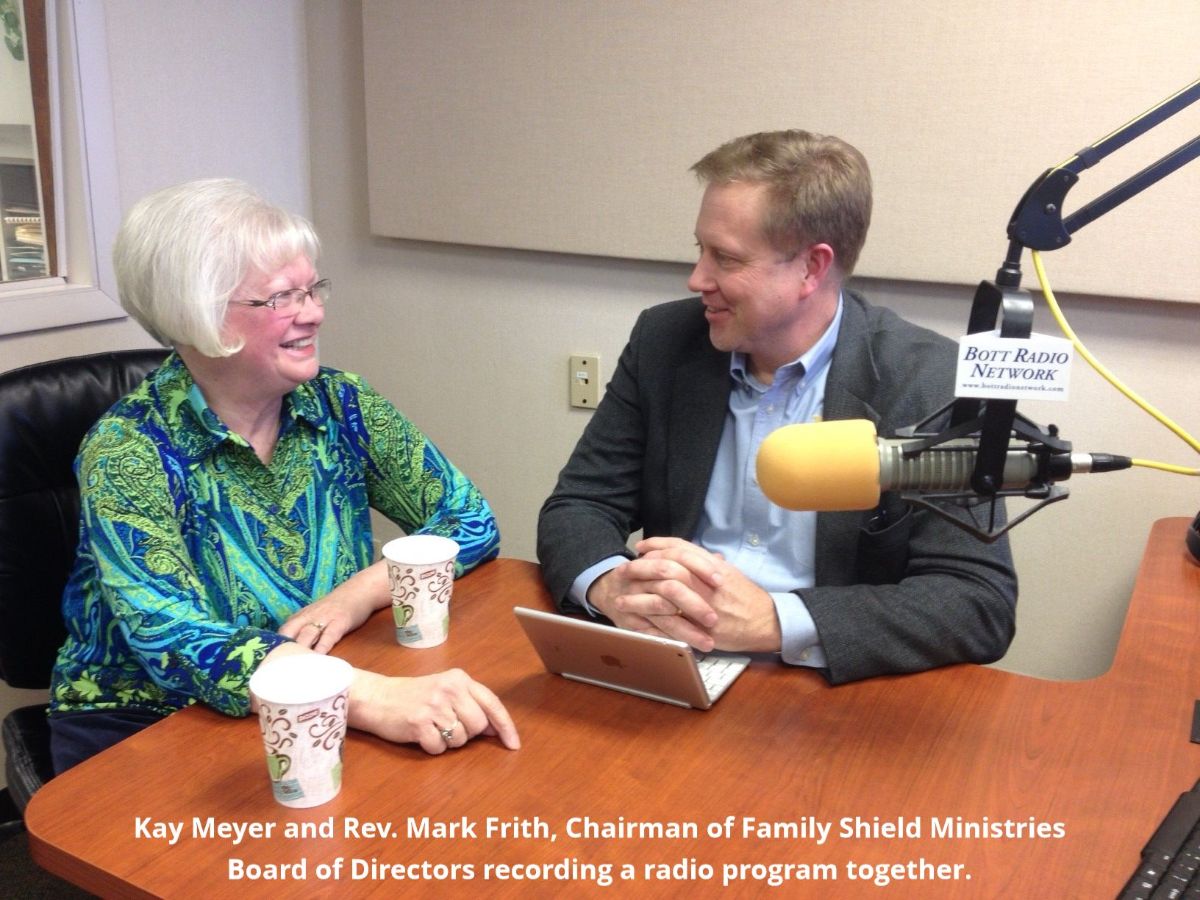 Kay Meyer and Rev. Mark Frith, Chairman of Family Shield Ministries Board of Directors recording a radio program together.